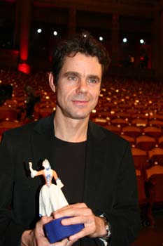 Tom Tykwer nimmt den Bayerischen Filmpreis entgegen - Foto: Andrea Pollak